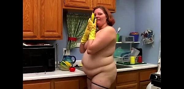  Hot and horny chubby housewife has a nice wank in the kitchen